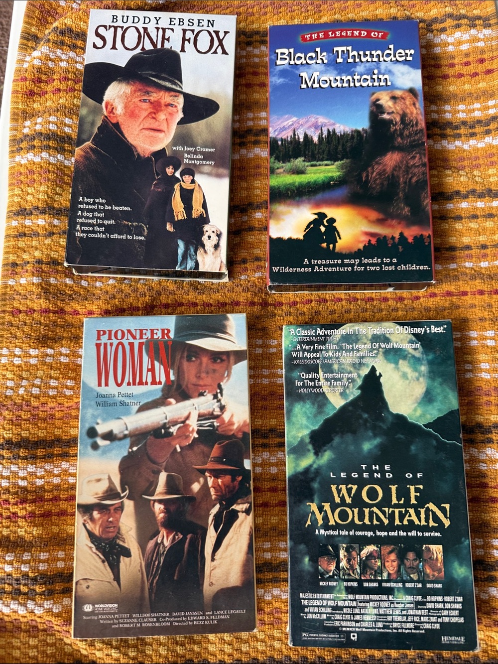 Four Classic Western/Adventure VHS Tapes - Multi-Color